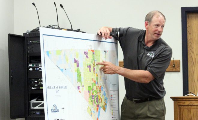 Dave Wiese, Howard community development director, points out on a map of the village where areas are zoned I-1 General Industrial.