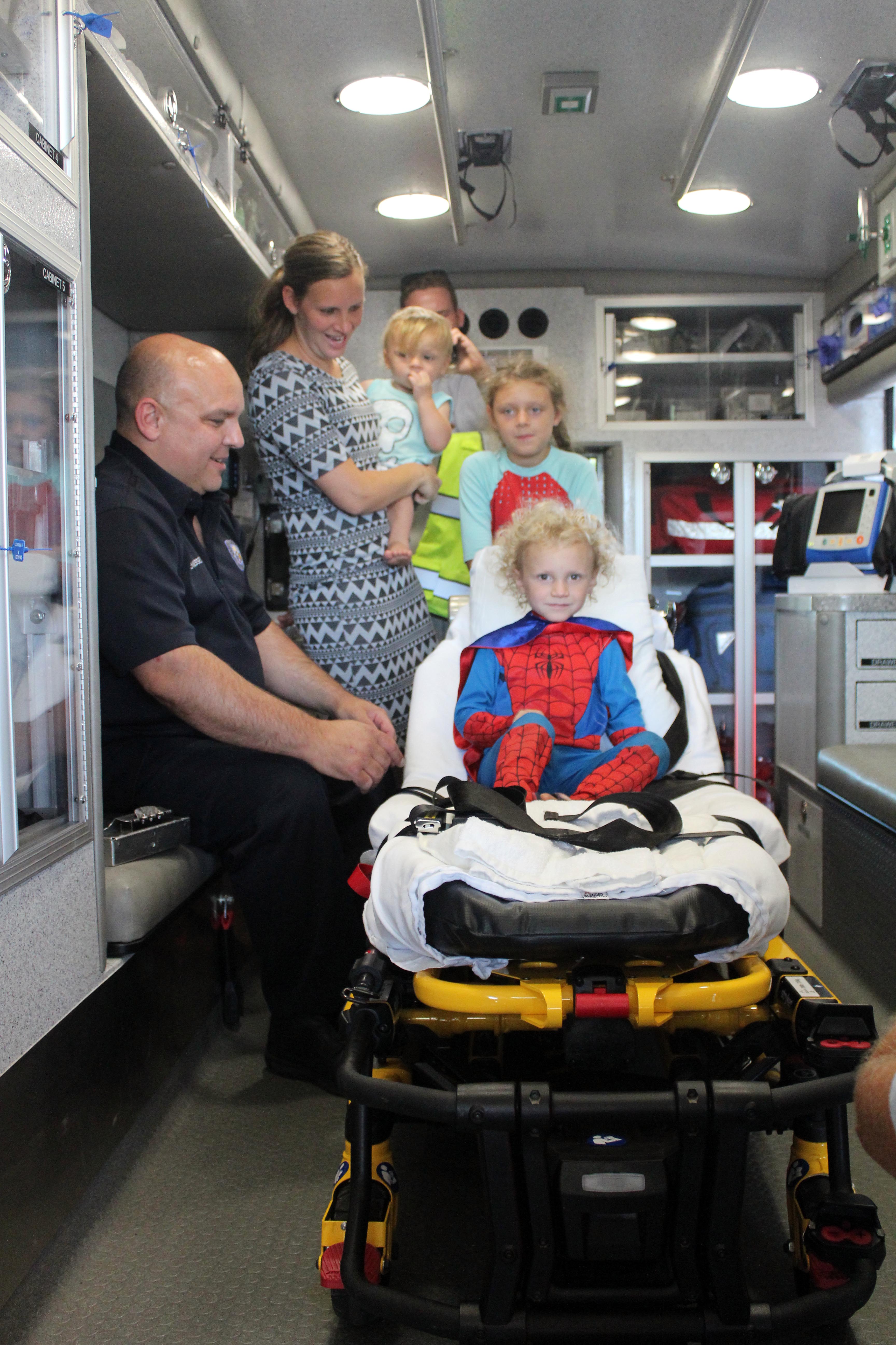 Boy who nearly drowned visits fire station