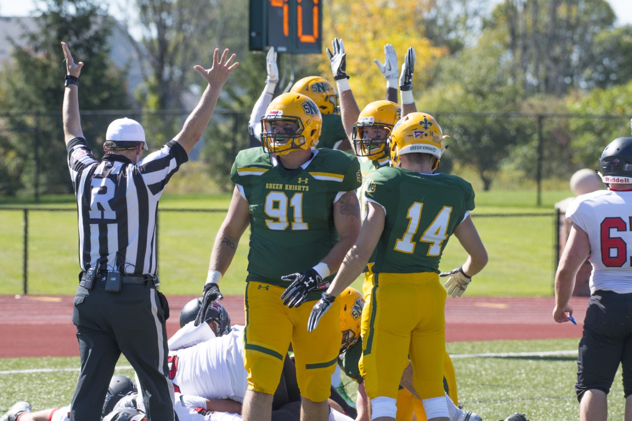 Green Knights score nearly in triple digits in rout of Grinnell