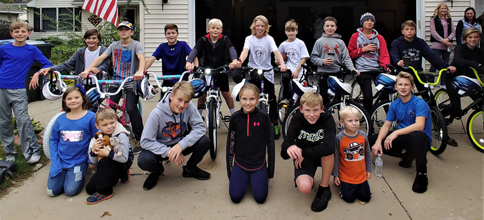 De Pere boys give back with bikes