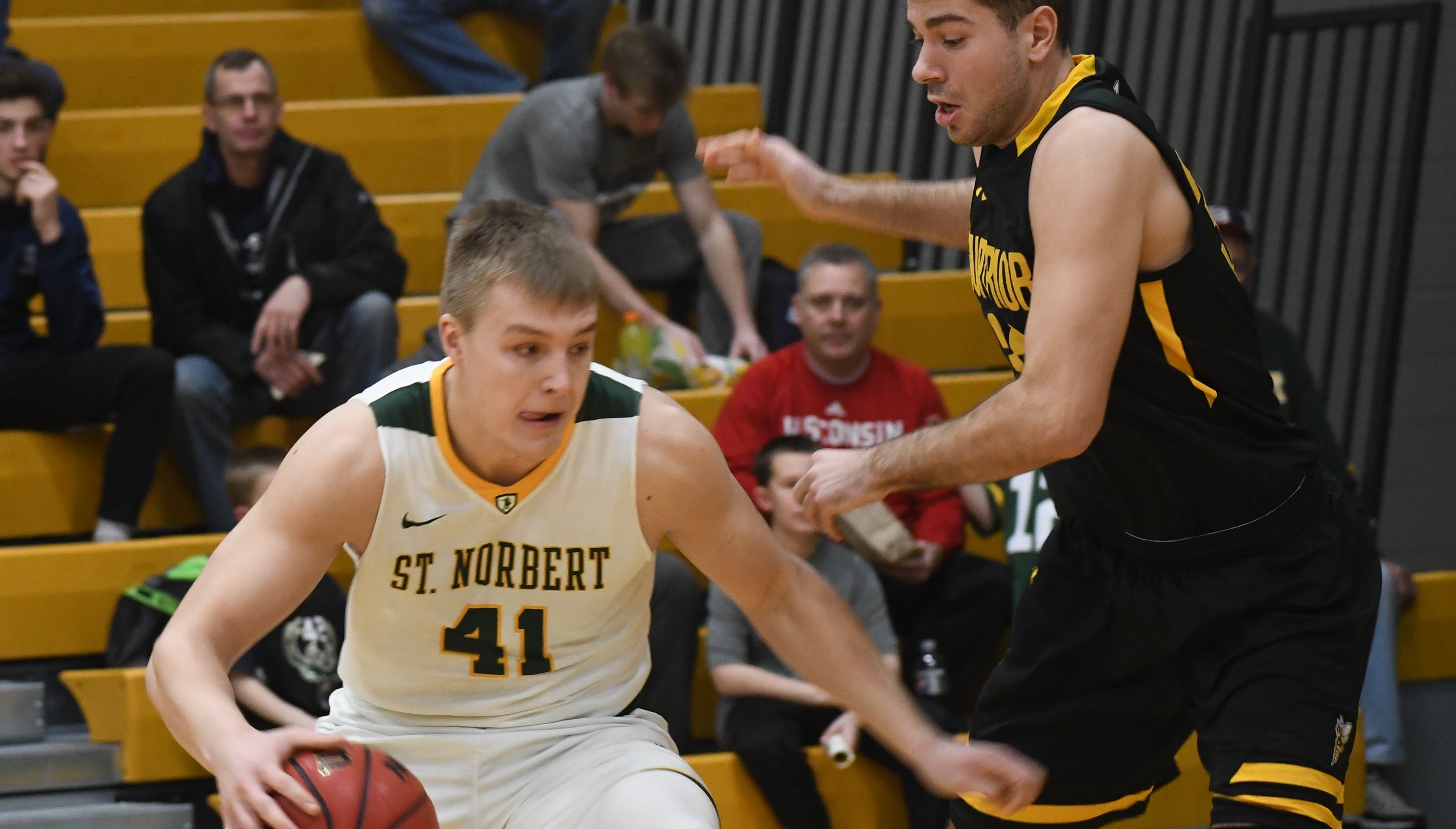 Green Knights use two big spurts to defeat Yellow Jackets