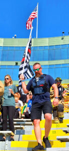 Participant carrying a flag