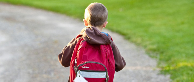 Stock photo of a child with a backpack