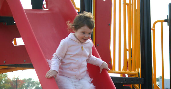 Child going down a slide
