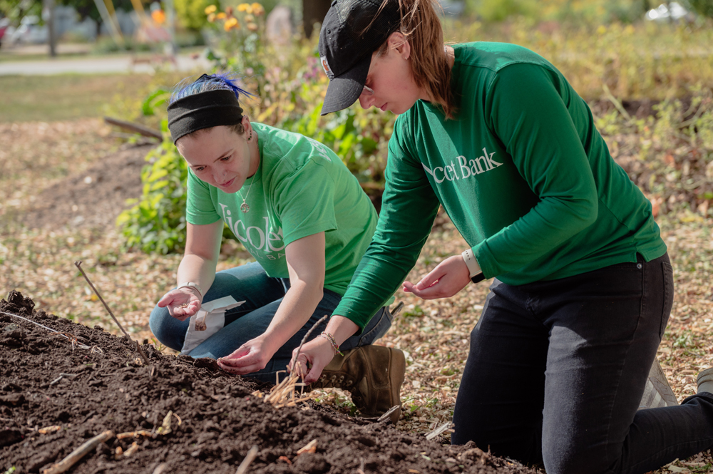 Nicolet National Bank volunteers Kat Coonrod, at left, and Maddie Korpi, right, were excited to find an opportunity to give back to the community. Shane Fitzsimmons photo