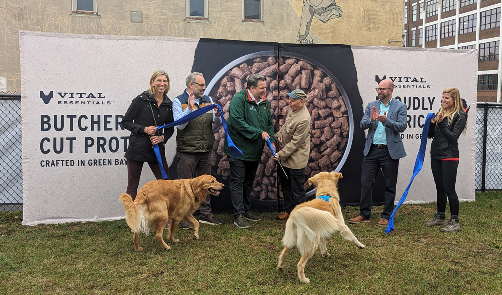 Representative from Vital Essentials, the City of Green Bay and On Broadway, Inc. -- and their dogs -- gathered to celebrate the opening of the Vital Essentials Dog Park last week with a ribbon-cutting ceremony.