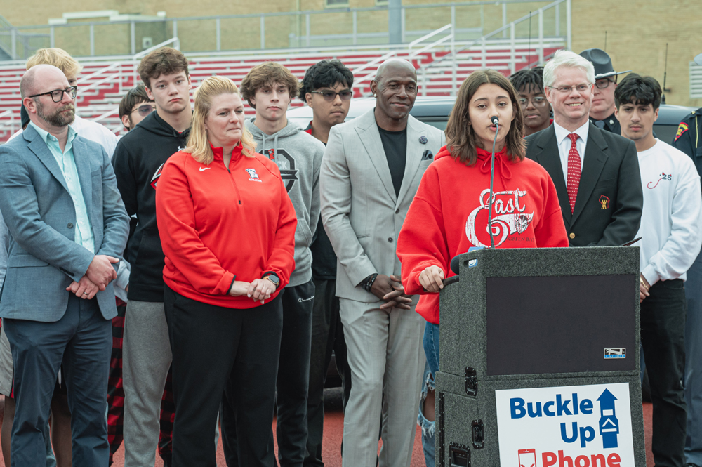Green Bay East student Keyana Perez, speaking in front, stated together we can do better when we drive. 9,677 crashes involved distracted driving last year according to the Wisconsin Department of Transportation. Shane Fitzsimmons photo