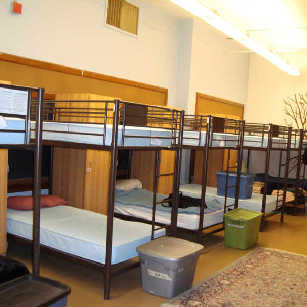 A row of 5 bunk beds