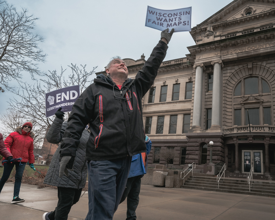 Rally-goers march around the Brown County Courthouse on Nov. 21. Shane Fitzsimmons photo