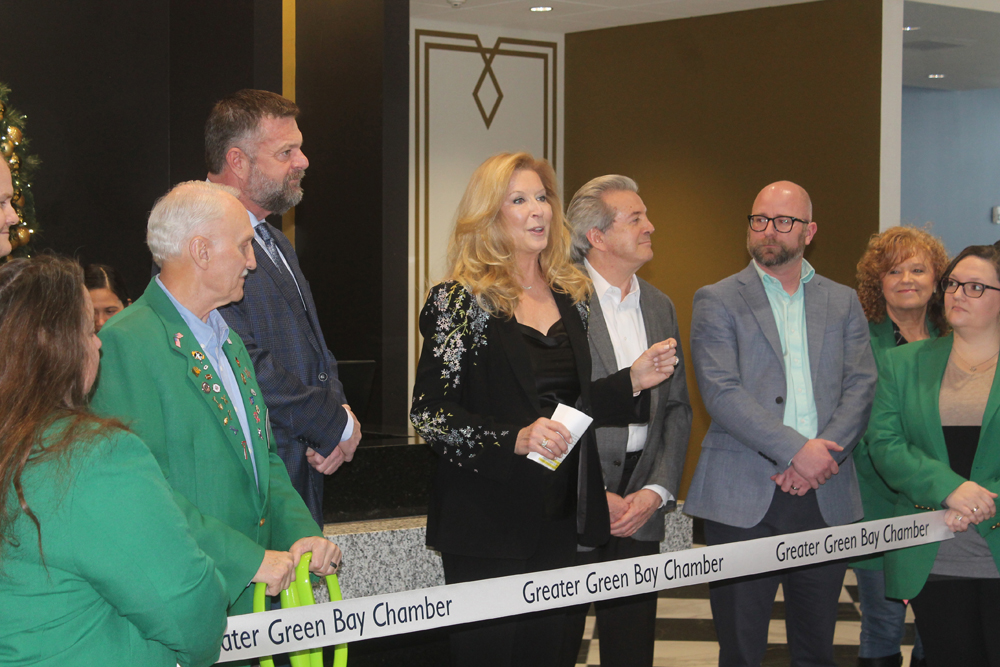 Legacy Hotel Majority Owner Vicki Fabry speaks at the official opening of the new boutique hotel near Lambeau Field