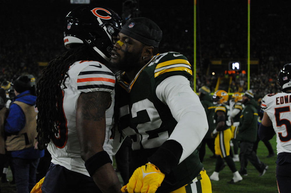 Green Bay Packers Outside Linebacker Rashan Gary takes a moment to talk to a Chicago Bears player during the 2023 season