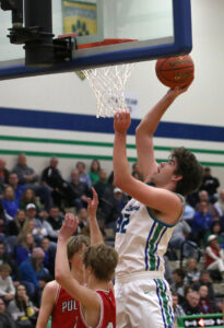 NDA's Andrew Rader leaps up to take a shot. 