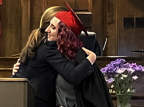 Kassandra Nooyen receives a hug from Brown County Circuit Judge Tammy Jo Hock during her graduation from Young Adult Treatment Court