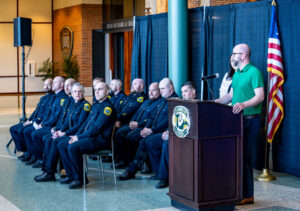 Green Bay Mayor Eric Genrich speaks during the ceremony at Lambeau Field